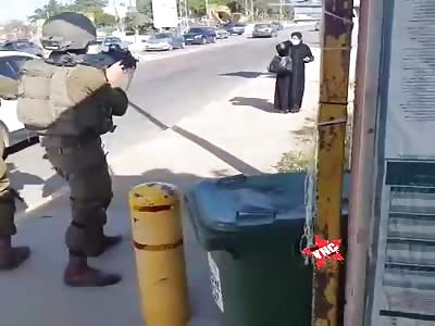 Palestinian woman armed with knife shot