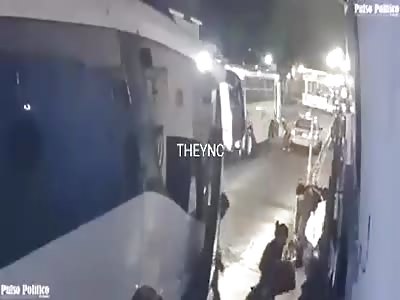 Crushed under the tires of a truck.