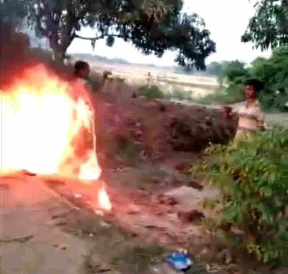 crazy woman catches fire