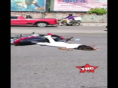 Woman dies with head crushed by truck