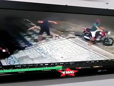 Hitman unloads his gun on security guard