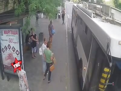 Woman stuck in bus door