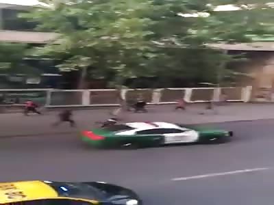 Cop Intentionally Runs over Protester (Chile)