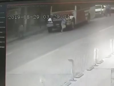 Old woman ranover by bus in Chihuahua, Mex