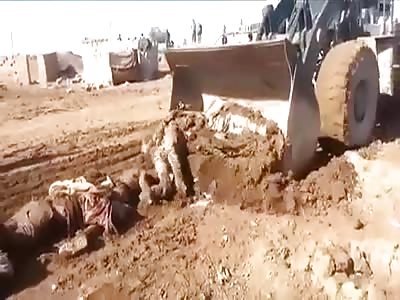 Iraqi soldiers raising the remains of other soldiers with machine after a showdown (part 2)