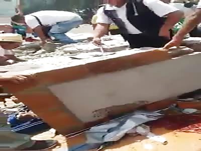 body buried beneath a huge concrete block