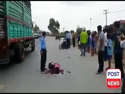 The dead motorcyclist in the middle of the road