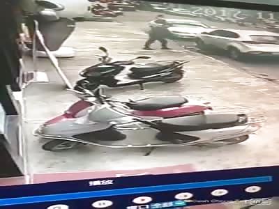 The man savagely hits the woman