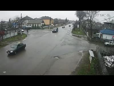 The motorcyclist flies through the air as a result of the crash