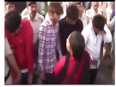 Alleged violators marched through the streets of India before being beaten by the crowd