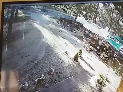 Merging vehicle causes motorcycle to rear-end it