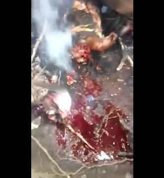 Short video shows body of a man accused of witchcraft decapitated and calcined