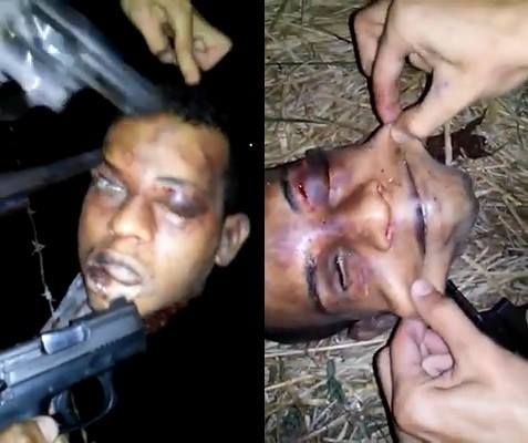 Sick: Brazilian gang having fun with the decapitated head of his rival