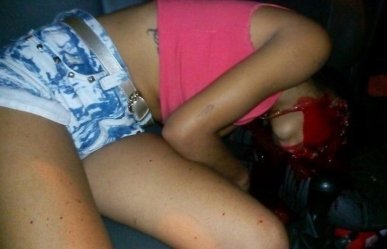 Young Woman With Face Covered in Blood After Execution