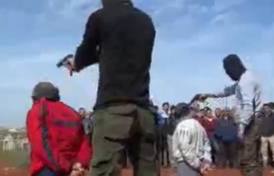  Public Execution shows 2 Kneeling Men Being Executed by Pistol 