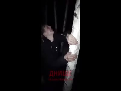 Nailed.  Punishment for losing the bosses drugs. 