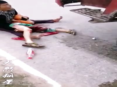 SAD: Man in Shock Holds in his arms of his Ripped Little Son