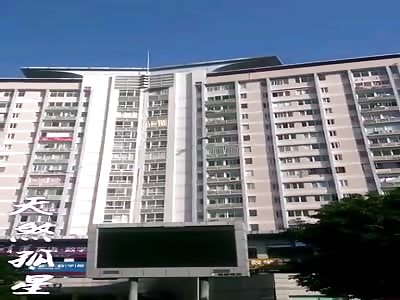 Woman jumped to commit suicide from the building