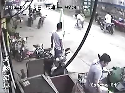 The woman was killed by a man with a kitchen knife on the road.