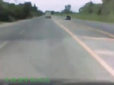 The car collides with the cargo truck