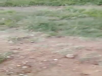 African woman paraded naked