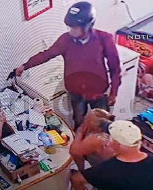 Store Owner Shot Dead in Robbery..