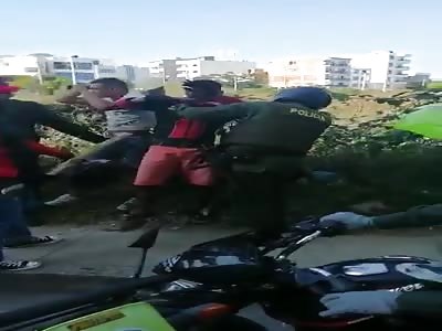 police arrest robbers before they are lynched