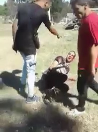 Thief being brutally beaten by angry people