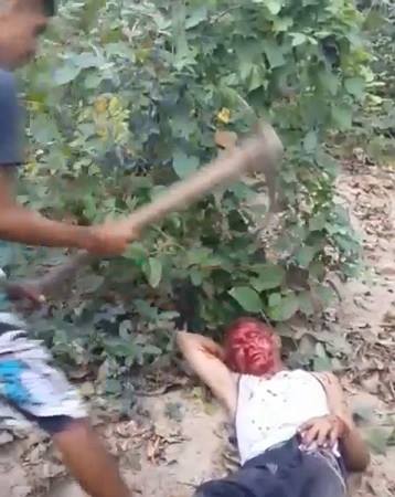 SHOCK video shows homeless man Being Brutally Killed With an Pickaxe blows