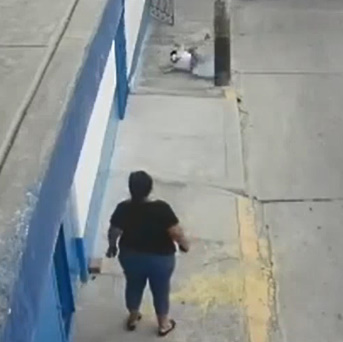 Woman Falls From Third Floor Of School Building In Peru.