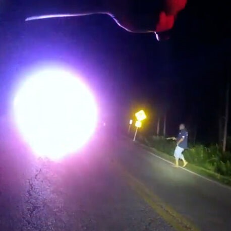 Bodycam Footage of Police Officers Shooting Armed Suspect in Woods