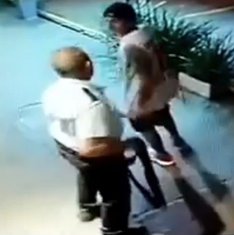 Security Guard Unloads His Shotgun Outside Bar In Paraguay