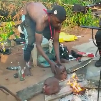 Ritualists Having Fun With Heads Of Male Victims