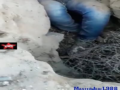 Guy killed lays in grave