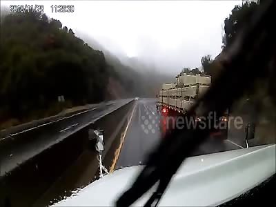 Truck crashes spectacularly in California, spilling cargo over road