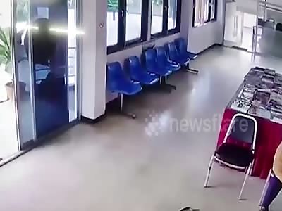 Thai man catches snake lunging at him with bare hands