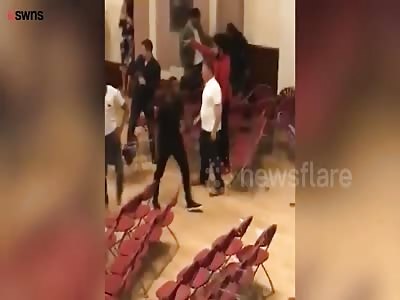 Female police officer being attacked as she screams in terror