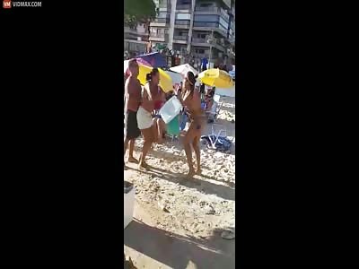 Two Women Fighting On The Beach