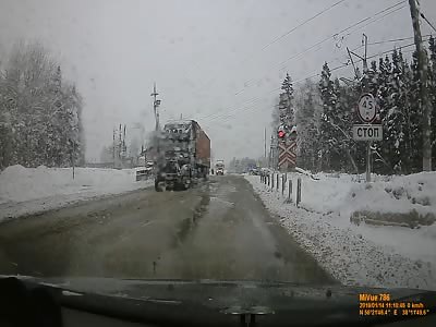 Stalled Semi Carrying Salt Ploughed by Train