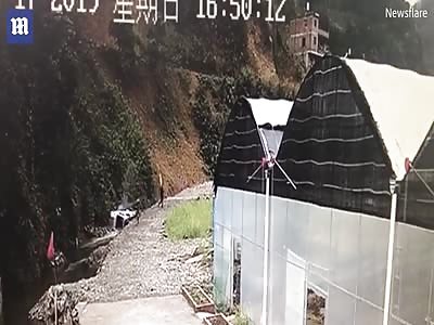 Moment minibus full of passengers tumbles down 30-metre cliff