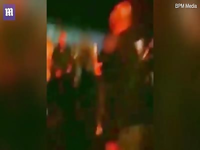 Armed gang viciously attack rival group with planks of wood