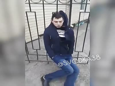 Murdered Man's Body Hanging on Fence 