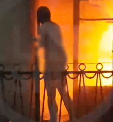 Naked Woman Saved From Fire