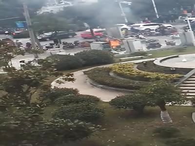 A gas canister exploded when a peddler's car caught fire near the scho