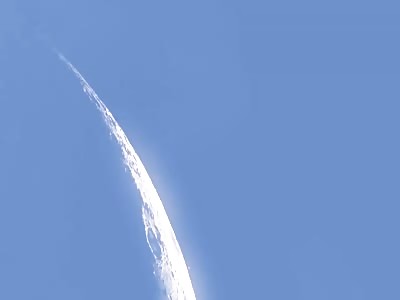 3 UFO's fly over moon casting shadows