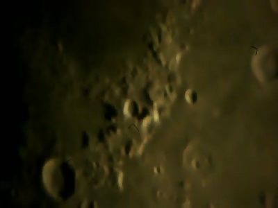 UFO Over Moon's Surface