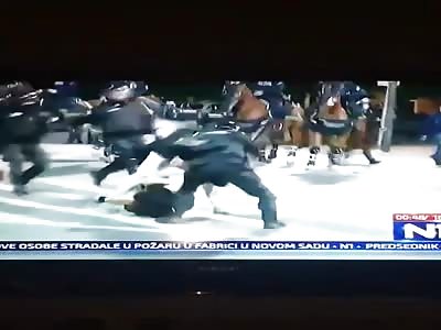 Police beating protesters