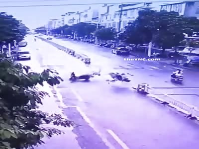 Biker Flys into Guardrail After Collision 