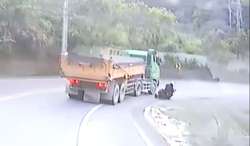 Biker Falls Under the Wheels of Semi