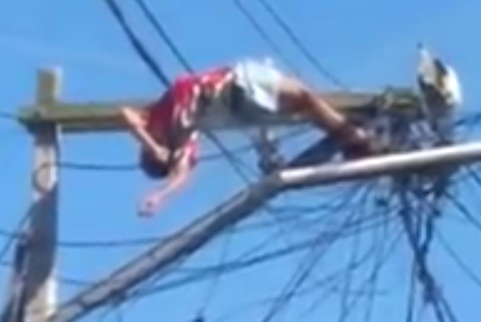Man Roasts Nicely on Powerlines